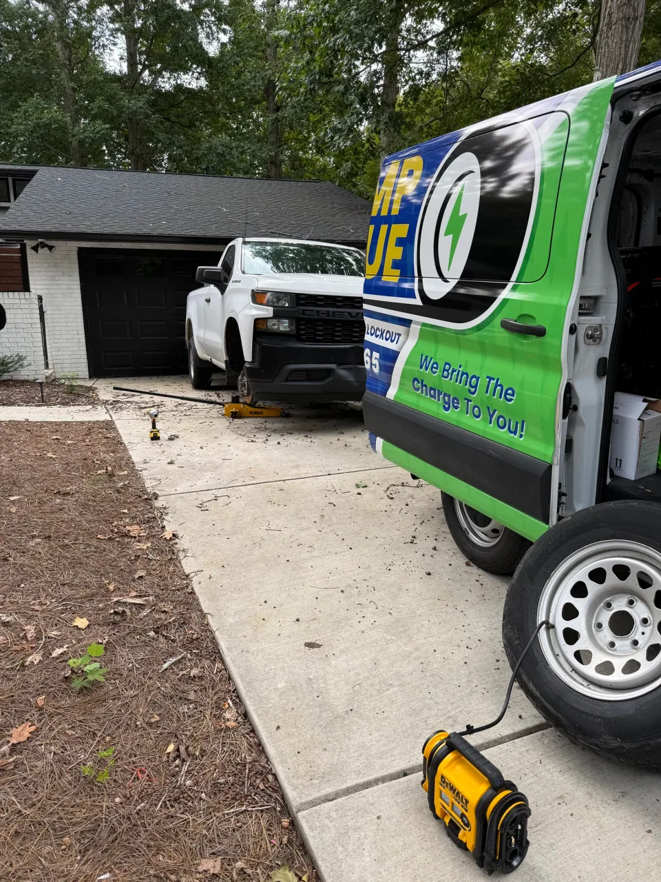 Amp Rescue service van providing roadside assistance in Garner, North Carolina